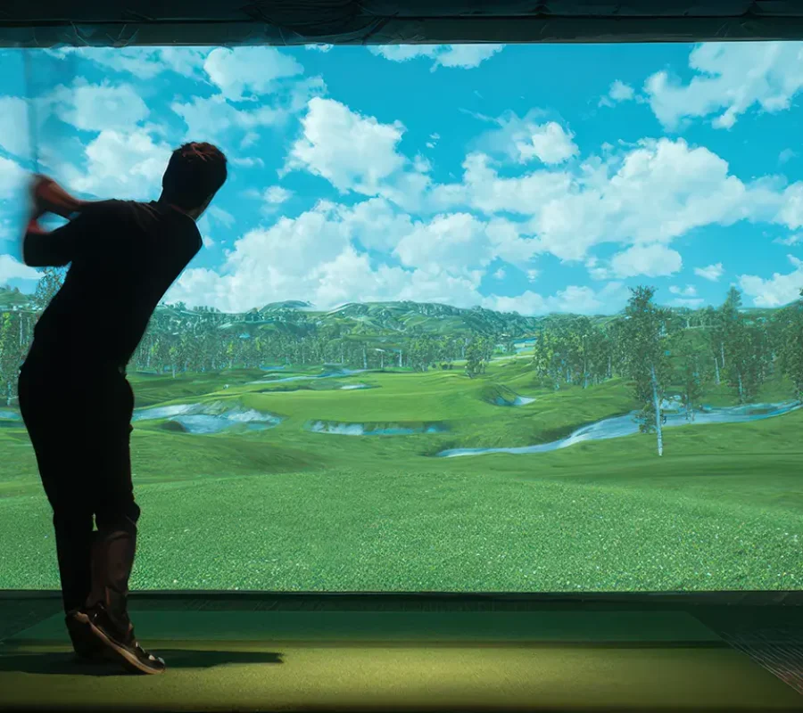 practicing your swing in an indoor golf simulator